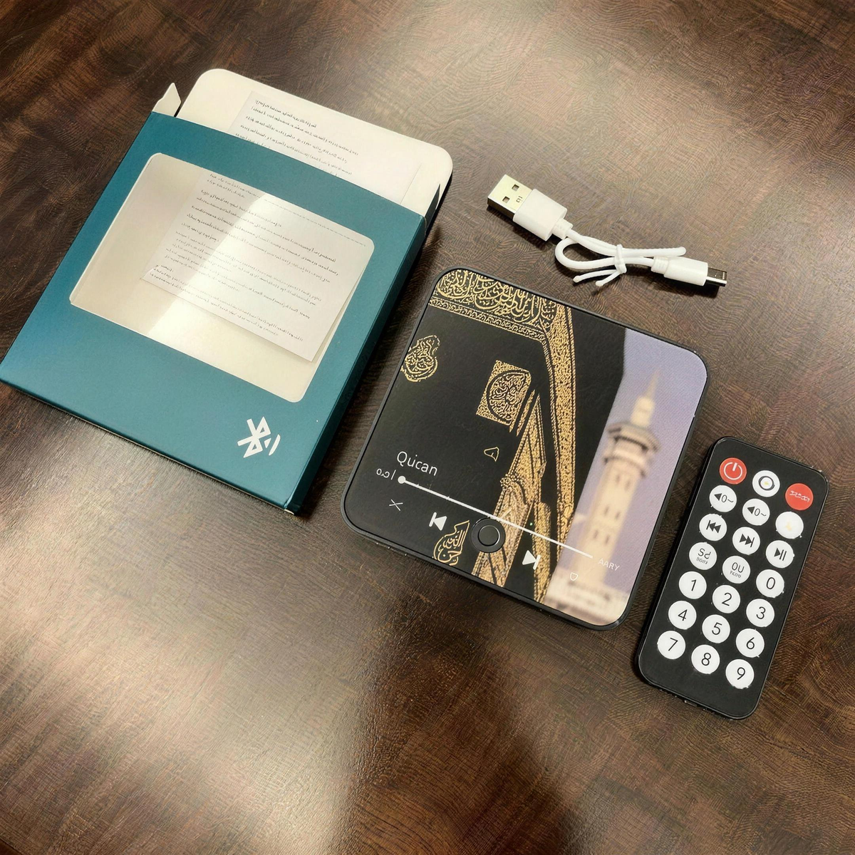 What's in the box — player, remote, USB-C cable and guide